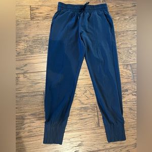 ZYIA size medium light weight black dressy joggers.